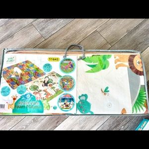 Reversible foam playmat.